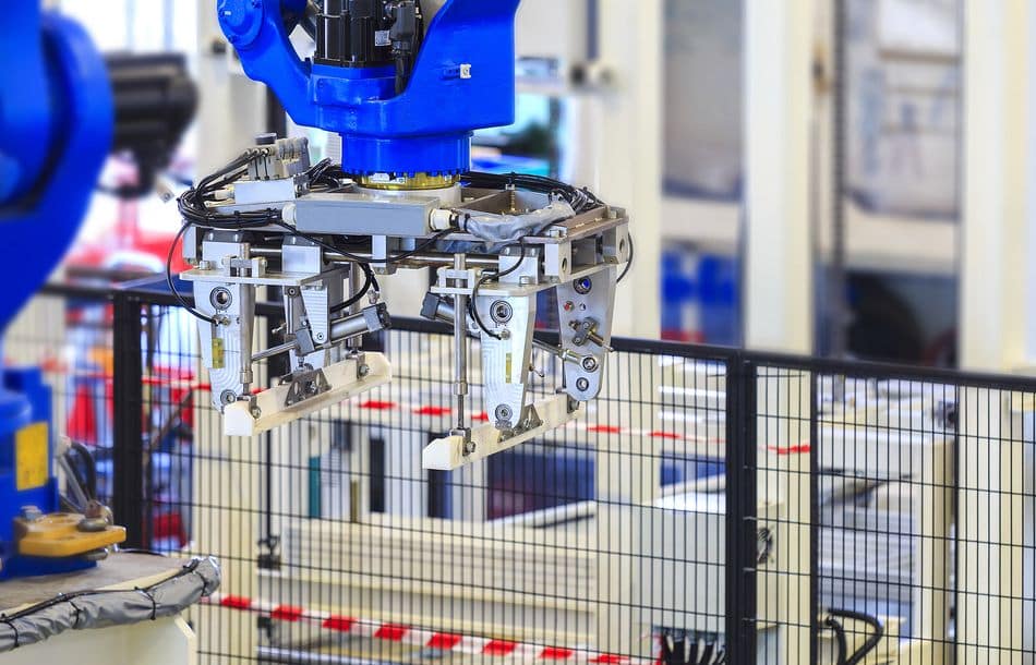 View of gripper unit on robot’s arm in production line